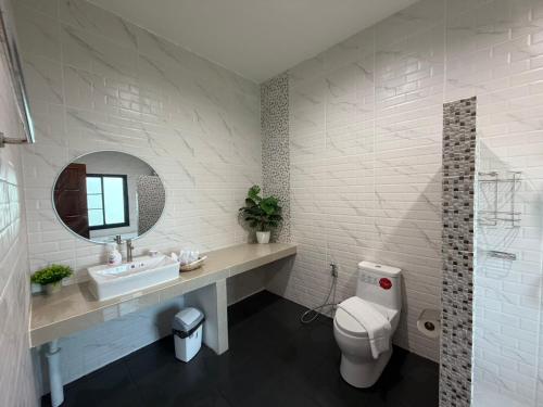 Koupelna v ubytování มานอนปัว โฮมสเตย์ น่าน Manornpua Homestay Nan