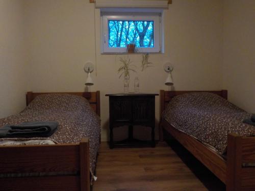 Ένα ή περισσότερα κρεβάτια σε δωμάτιο στο Lyngsasgaard M