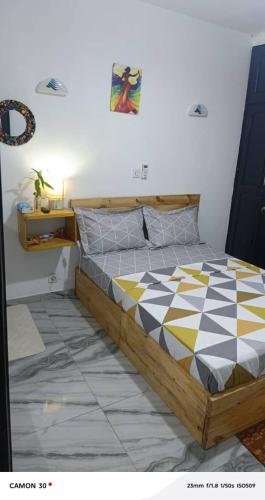 Giường trong phòng chung tại Chez Tyka