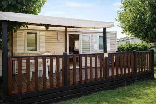 En have udenfor Mobil-home 4 à 6 personnes dans camping le Neptune