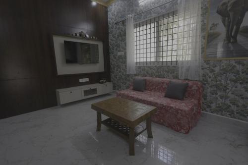 Χώρος καθιστικού στο Coconut Sooru,Managed By Triora Escapes