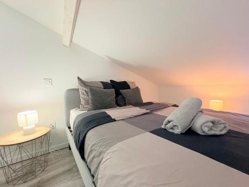 Postel nebo postele na pokoji v ubytování Le Refuge du Midi