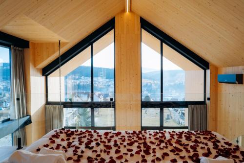 Postel nebo postele na pokoji v ubytování Calm Luxury Chalet Natural Apartments