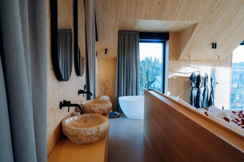 Koupelna v ubytování Calm Luxury Chalet Natural Apartments