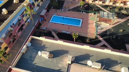 Swimmingpoolen hos eller tæt på Casa Azul - La Caleta