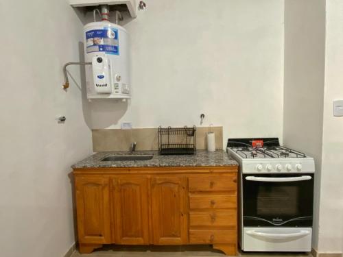 Küche/Küchenzeile in der Unterkunft ALQUIFE, complejo de departamentos