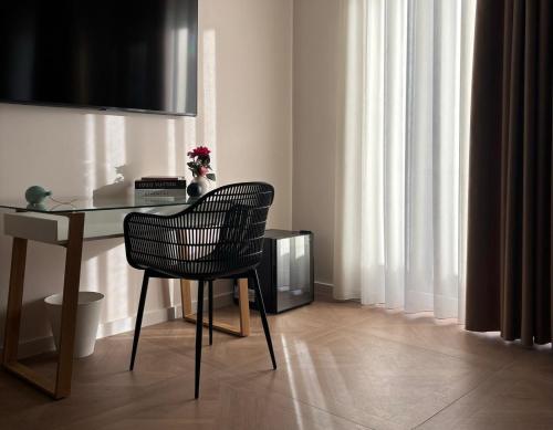 TV a/nebo společenská místnost v ubytování 50 Passi dal Duomo