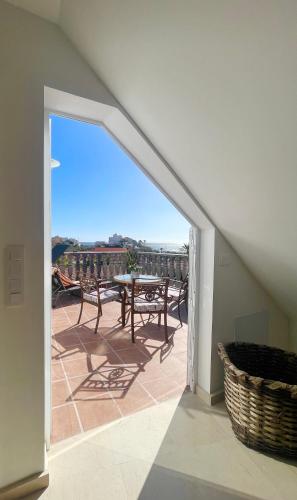 a view of a patio with a table and chairs at Penthouse Jul&Mel in Valle Gran Rey