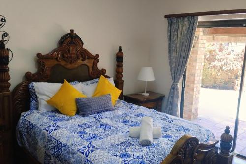 En eller flere senge i et værelse på Still Waters