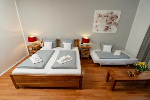 Ένα ή περισσότερα κρεβάτια σε δωμάτιο στο ARTHOTEL Herrsching