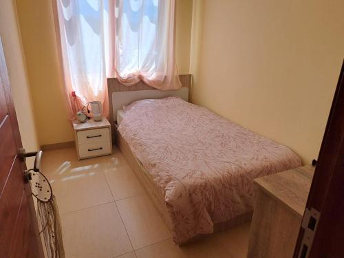 Ένα ή περισσότερα κρεβάτια σε δωμάτιο στο Joli duplex situé dans une résidence sécurisée