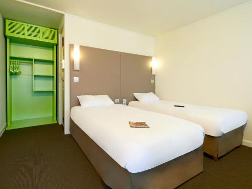 Cama o camas de una habitación en Campanile Dijon Sud - Marsannay