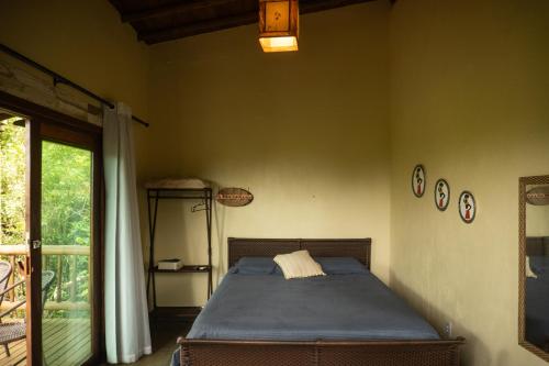 En eller flere senge i et værelse på a casinha