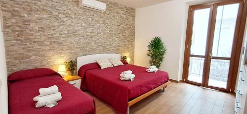 En eller flere senge i et værelse på New Alguerhouse