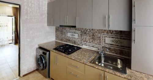 Kuchyň nebo kuchyňský kout v ubytování New Garni 2