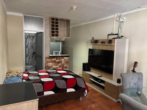 Et tv og/eller underholdning på Chiclayo Living Tu Apartamento Ideal en el Centro