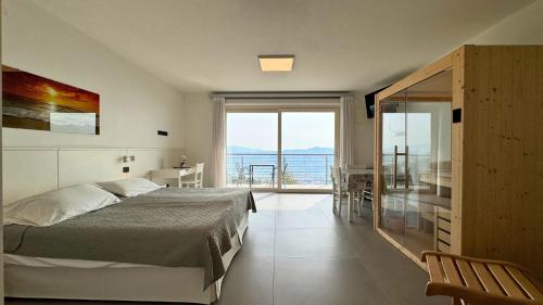 En eller flere senge i et værelse på Appartamenti Annachiara