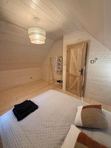 Postel nebo postele na pokoji v ubytování W Sam Las