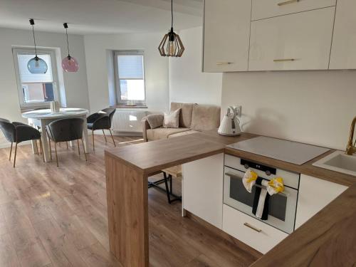 Et opholdsområde på Apartament przyjazny pod Dzikowcem