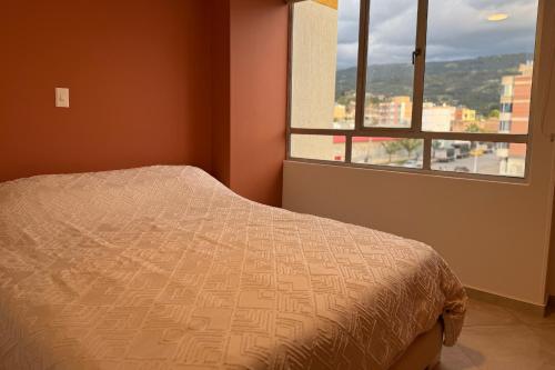 Postel nebo postele na pokoji v ubytování Exclusivo Apartamento en Sogamoso