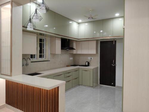 Køkken eller tekøkken på Meghana Homestays