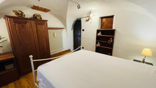 Ένα ή περισσότερα κρεβάτια σε δωμάτιο στο Mamy