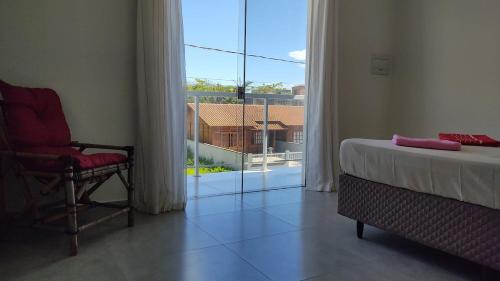 Postel nebo postele na pokoji v ubytování Sobrado Inteiro pé na areia em Itapoá!