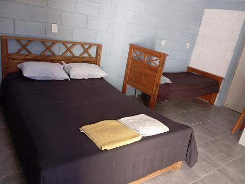 Ένα ή περισσότερα κρεβάτια σε δωμάτιο στο Monoambiente cosquin