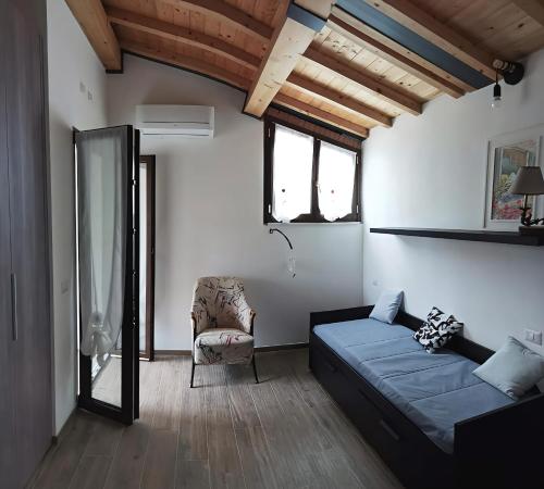 En eller flere senge i et værelse på Villa Mirasole