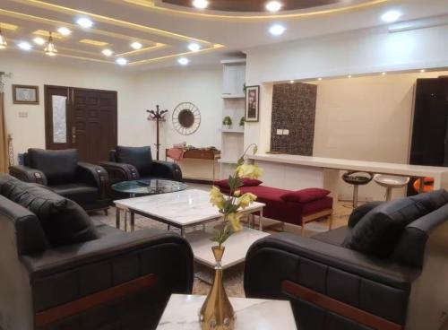 Et opholdsområde på Cottage In Changla Gali - Secluded, Cozy Stay