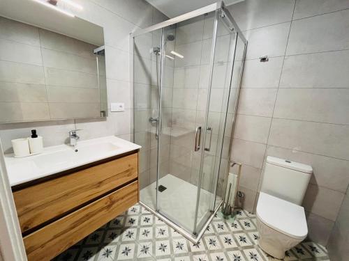 Koupelna v ubytování Valdeflores Flats Bj