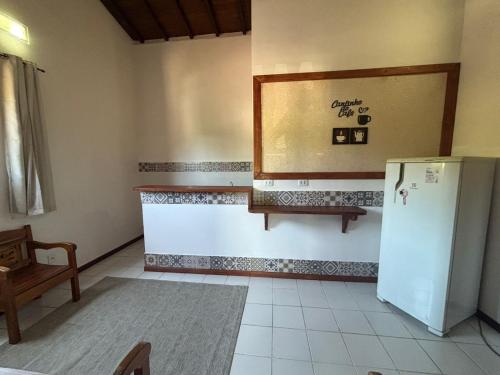 Køkken eller tekøkken på FLATS e SUÍTES NATIVA