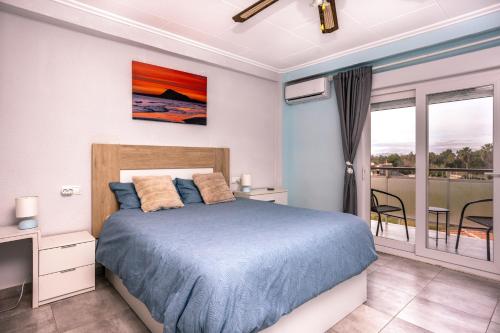 Postel nebo postele na pokoji v ubytování Vista Segária, Playa Deveses