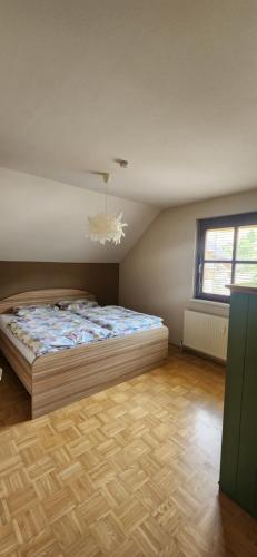 Ένα ή περισσότερα κρεβάτια σε δωμάτιο στο Alpska idila