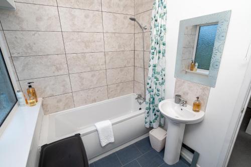 Et badeværelse på Heol Yr Eos Family Getaway