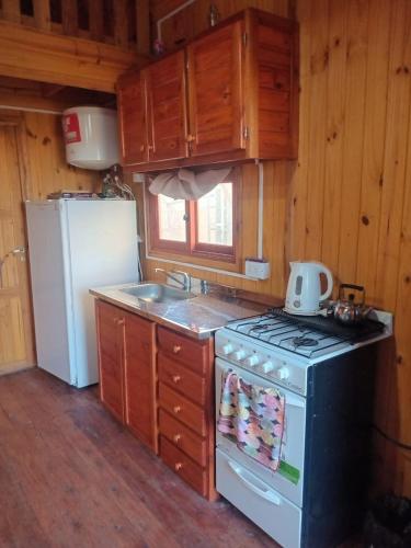 Køkken eller tekøkken på Cabaña de descanso A 150 mt del río