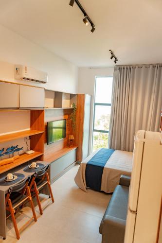 Llit o llits en una habitació de Flat Sonne Bessa