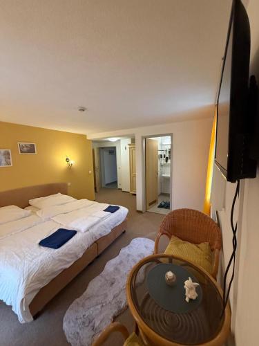 Giường trong phòng chung tại Restaurant & Pension Yammas