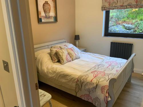 Postel nebo postele na pokoji v ubytování Carrick Chalets - 1