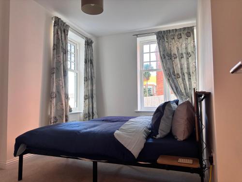 Postel nebo postele na pokoji v ubytování Seashell Retreat