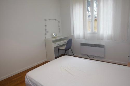Postel nebo postele na pokoji v ubytování Chambre privée dans bel appartement lumineux