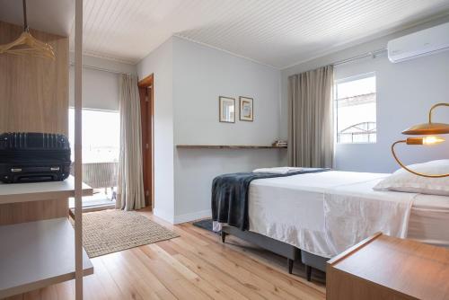 En eller flere senge i et værelse på Casa Sunset