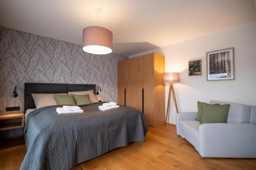 Giường trong phòng chung tại Apartmány Horizont