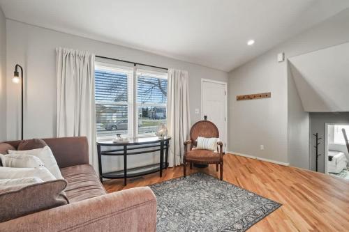 a living room with a couch and a table at Haven Oasis in Nampa