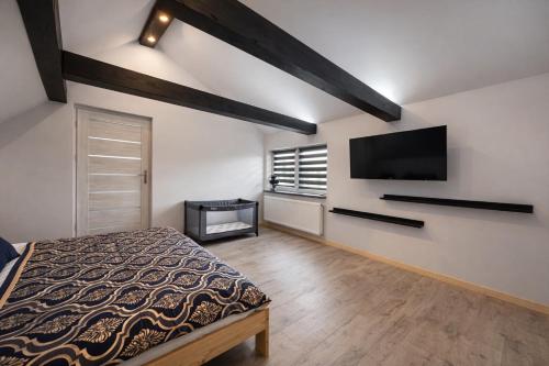 Postel nebo postele na pokoji v ubytování Dom u Teresy