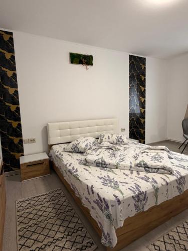 En eller flere senge i et værelse på Casa SEMA