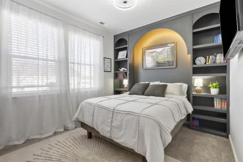 Giường trong phòng chung tại Casa Enclave GUEST HOUSE