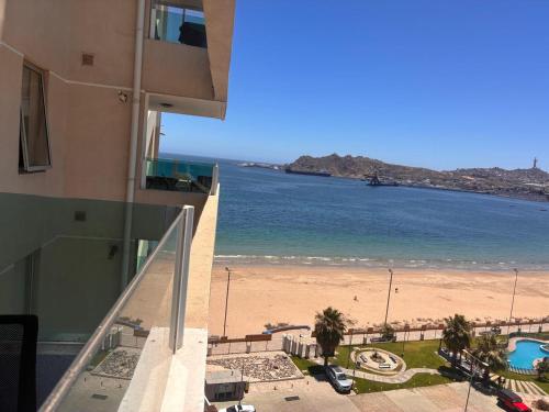 a view of a beach from a building at Depto playa herradura in Coquimbo