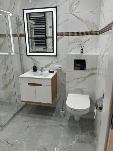 Koupelna v ubytování Apartament Ostrowiec Świętokrzyski