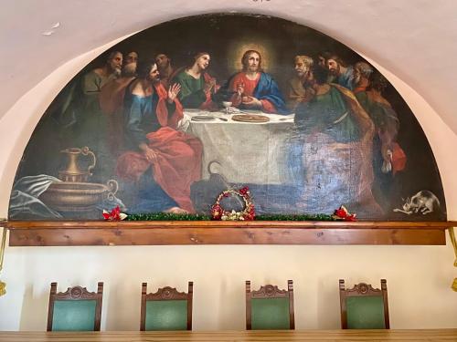 Een restaurant of ander eetgelegenheid bij Oasi Francescana il Monastero